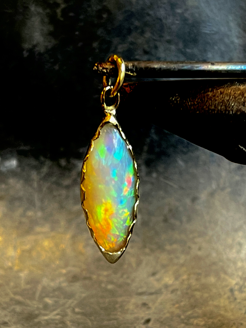 welo mined fire opal set in 14ct gold